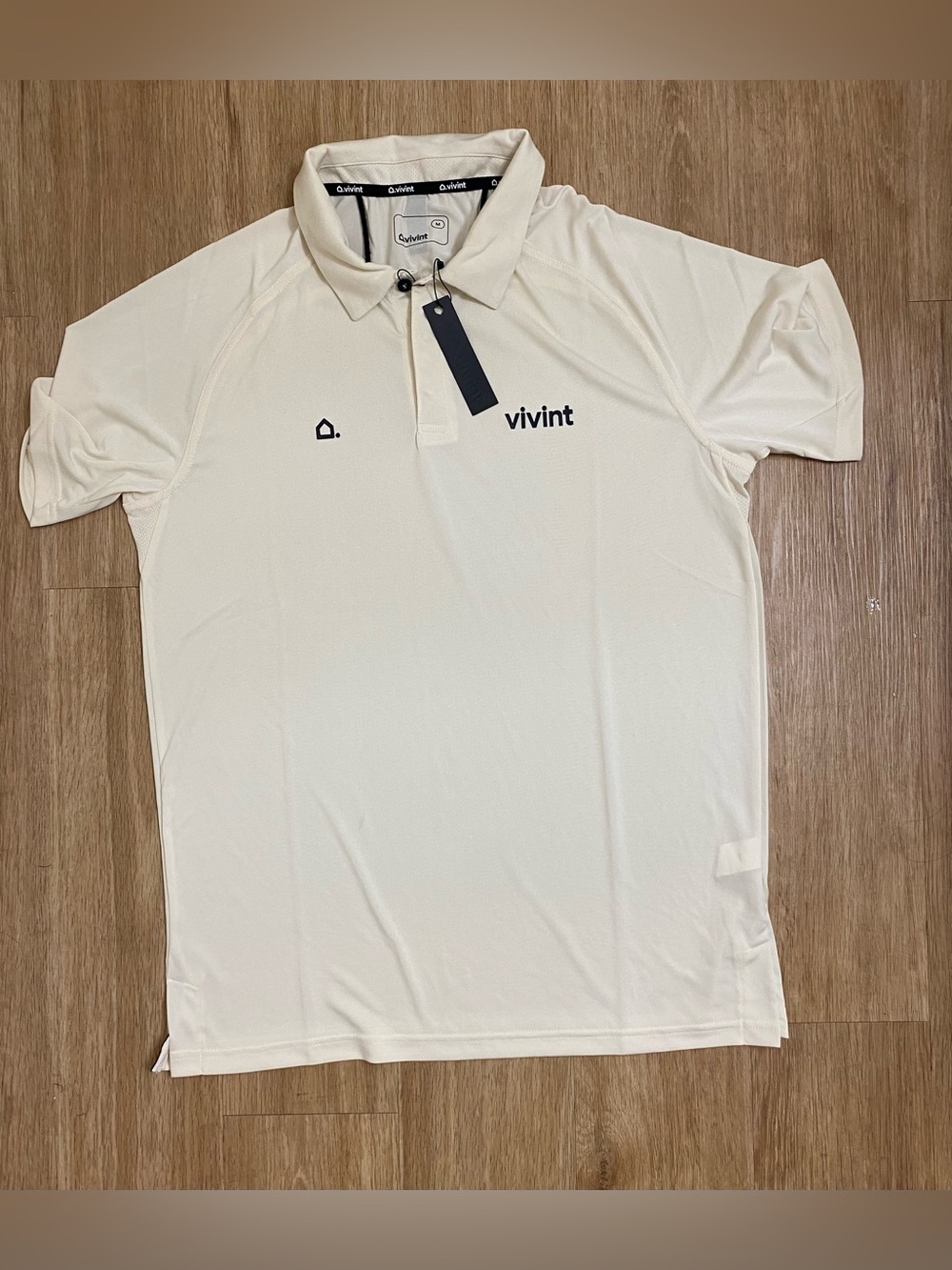 Vivint Cream Polo Shirt with Black Logo